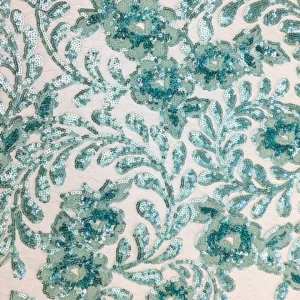 Pizzo con paillettes turchese